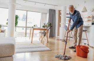 Man cleaning his apartment